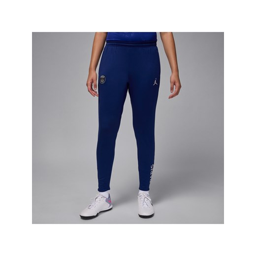 Damskie dzianinowe spodnie piłkarskie Jordan Dri-FIT Paris Saint-Germain Strike (wersja czwarta) - Niebieski ze sklepu Nike poland w kategorii Spodnie damskie - zdjęcie 178609898