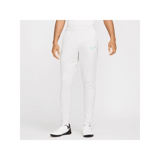 Męskie spodnie piłkarskie Dri-FIT Nike Academy - Szary ze sklepu Nike poland w kategorii Spodnie męskie - zdjęcie 178610328
