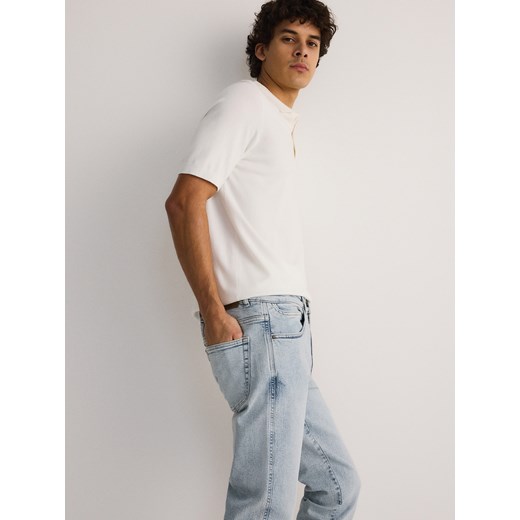 Reserved - Jeansy slim z efektem sprania - niebieski Reserved 32 Reserved