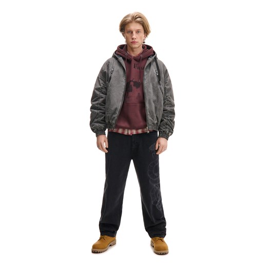 Cropp - Czarne jeansy skater z tekstową naszywką - szary ze sklepu Cropp w kategorii Jeansy męskie - zdjęcie 178695608