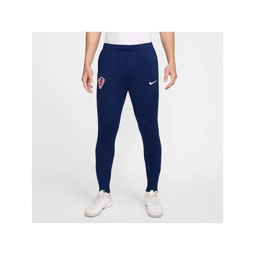 Męskie spodnie piłkarskie Nike Dri-FIT Chorwacja Strike - Niebieski ze sklepu Nike poland w kategorii Spodnie męskie - zdjęcie 178785215