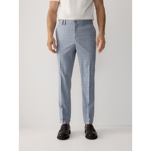 Reserved - Garniturowe spodnie slim fit - niebieski ze sklepu Reserved w kategorii Spodnie męskie - zdjęcie 178919177