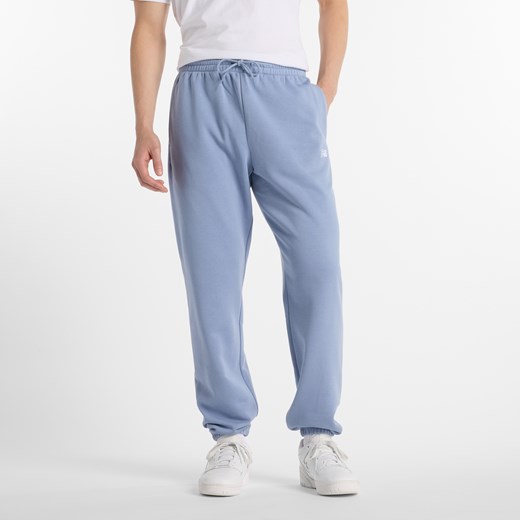 Spodnie męskie New Balance MP41519DUS – niebieskie ze sklepu New Balance Poland w kategorii Spodnie męskie - zdjęcie 178929697