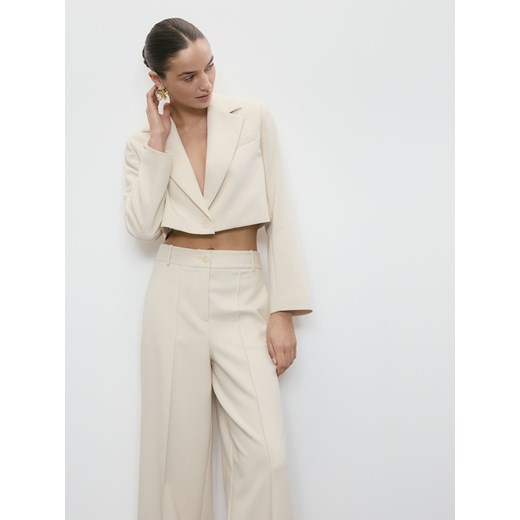 Reserved - Spodnie z kantem - złamana biel Reserved XL Reserved