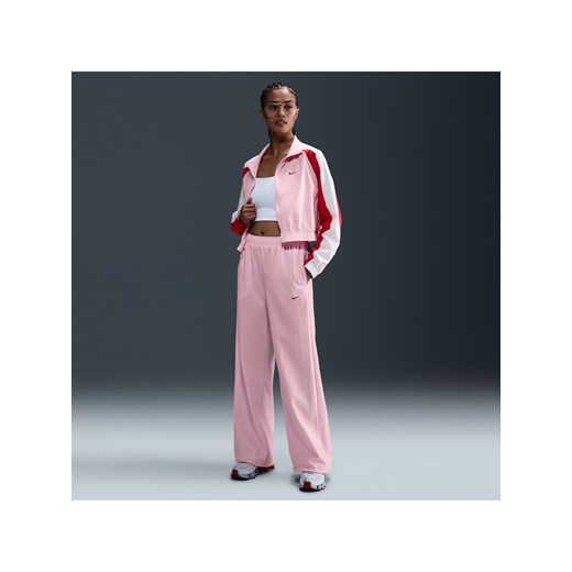 Damskie spodnie z tkaniny Nike Sportswear - Różowy ze sklepu Nike poland w kategorii Spodnie damskie - zdjęcie 178945565