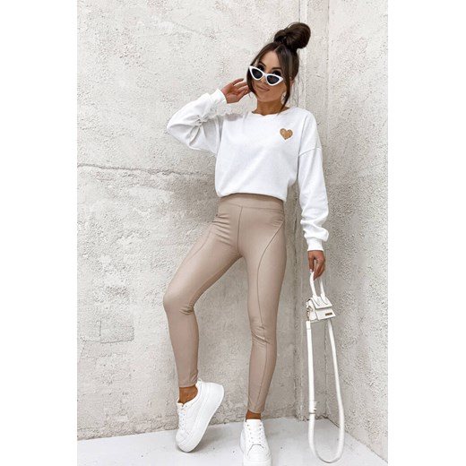 WOSKOWANE LEGGINSY Z WYSOKIM STANEM Z PRZESZYCIAMI- BEŻOWY ze sklepu olika.com.pl w kategorii Spodnie damskie - zdjęcie 178969965