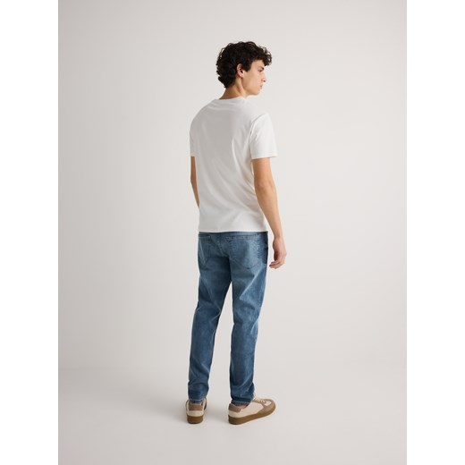 Reserved - Jeansy slim z efektem sprania - niebieski Reserved 30 Reserved