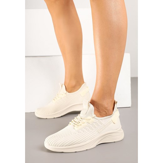 Buty sportowe damskie Born2be sneakersy beżowe na płaskiej podeszwie sznurowane