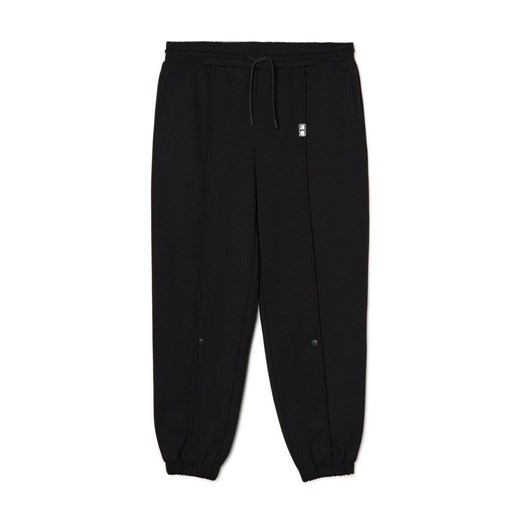 Cropp - Czarne dresy z drobnym nadrukiem - czarny Cropp XS Cropp