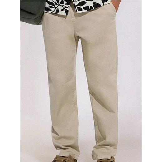 Sinsay - Spodnie chino jogger - beżowy ze sklepu Sinsay w kategorii Spodnie męskie - zdjęcie 179127099