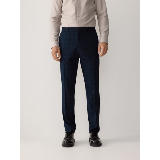 Reserved - Spodnie garniturowe slim fit - granatowy ze sklepu Reserved w kategorii Spodnie męskie - zdjęcie 179143598