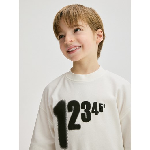 Reserved - T-shirt oversize z nadrukiem - złamana biel ze sklepu Reserved w kategorii T-shirty chłopięce - zdjęcie 179226666