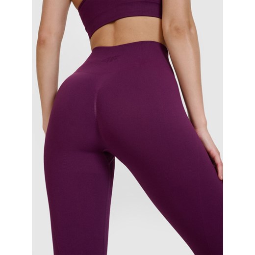 Damskie legginsy do jogi bezszwowe 4F 4FWSS25TFTIF347 - fioletowe ze sklepu Sportstylestory.com w kategorii Spodnie damskie - zdjęcie 179232067