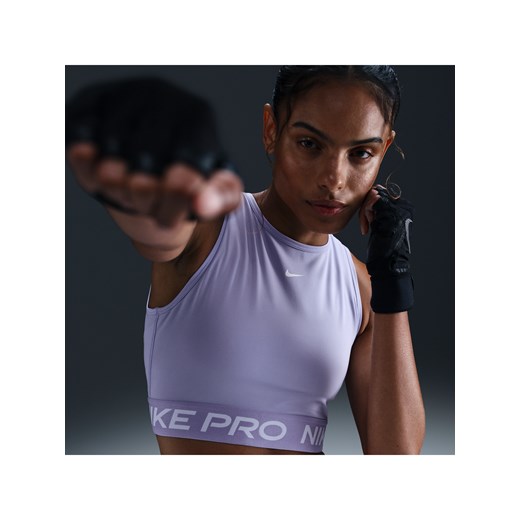 Damska koszulka bez rękawów o skróconym kroju Dri-FIT Nike Pro - Fiolet ze sklepu Nike poland w kategorii Bluzki damskie - zdjęcie 179308475