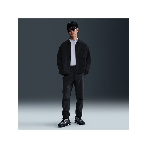 Męskie spodnie z tkaniny Nike Tech - Szary ze sklepu Nike poland w kategorii Spodnie męskie - zdjęcie 179309037