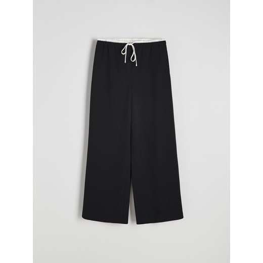 Reserved - Spodnie jogger - czarny - id: 2565I-99X - marki Reserved - 179335886 Reserved - Spodnie jogger - czarny ze sklepu Reserved w kategorii Spodnie damskie - zdjęcie 179335886