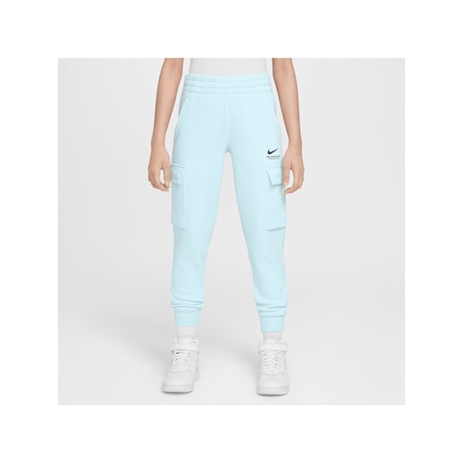 Bojówki z dzianiny dla dużych dzieci Nike Sportswear - Niebieski ze sklepu Nike poland w kategorii Spodnie damskie - zdjęcie 179364617