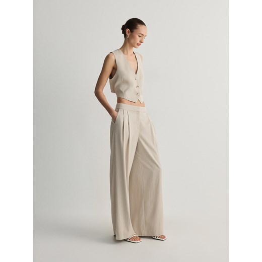 Reserved - Spodnie z wiskozą - beżowy Reserved S Reserved okazja