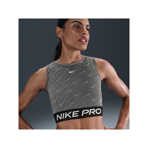 Damska koszulka o skróconym kroju bez rękawów z nadrukiem Dri-FIT Nike Pro - Czerń ze sklepu Nike poland w kategorii Bluzki damskie - zdjęcie 179409166