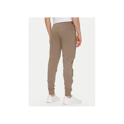 HUGO Spodnie dresowe Liam 50540918 Beżowy Regular Fit L MODIVO