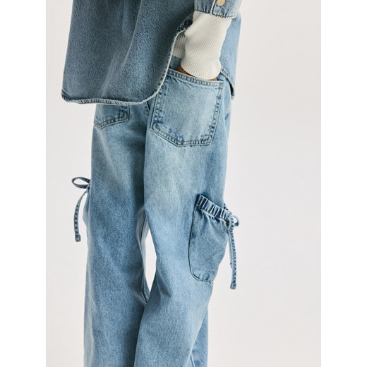 Reserved - Jeansy wide leg z ozdobnymi kieszeniami - niebieski Reserved 116 (5-6 lat) Reserved