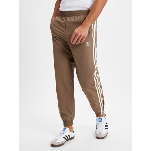 adidas Originals Męskie spodnie dresowe - Firebird Mężczyźni brązowy jednolity ze sklepu vangraaf w kategorii Spodnie męskie - zdjęcie 179489766