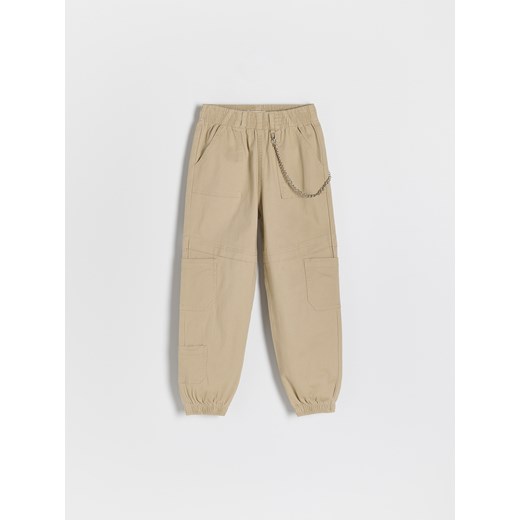 Reserved - Spodnie z łańcuszkiem - beżowy Reserved 116 (5-6 lat) Reserved