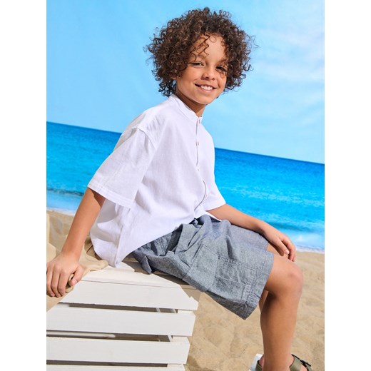 Sinsay - Bawełniane szorty regular z kieszeniami cargo - granatowy Sinsay 158 Sinsay