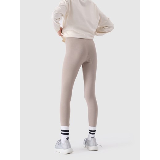 Dziewczęce legginsy basic 4F 4FJWSS25TTIGF198 - beżowe ze sklepu Sportstylestory.com w kategorii Spodnie dziewczęce - zdjęcie 179596499