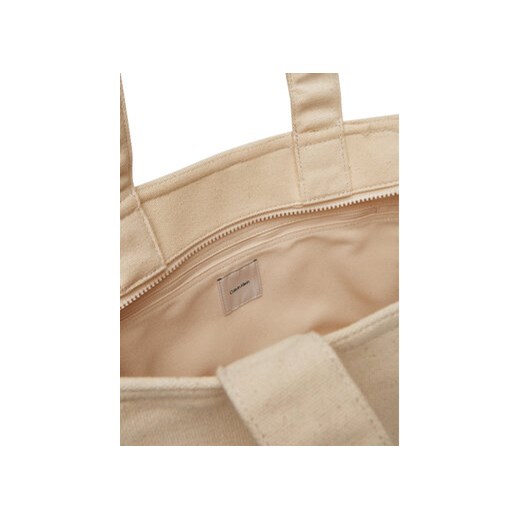 Beżowa shopper bag Calvin Klein mieszcząca a4 na ramię
