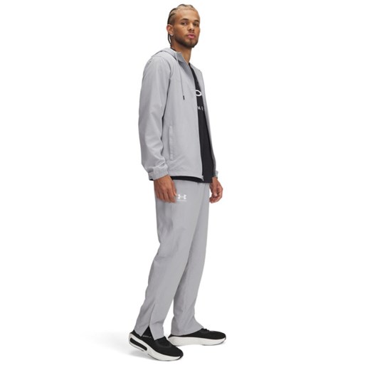 Męskie spodnie casual tkaninowe Under Armour UA Rival Woven Windbreaker Pant - szare ze sklepu Sportstylestory.com w kategorii Spodnie męskie - zdjęcie 179637165