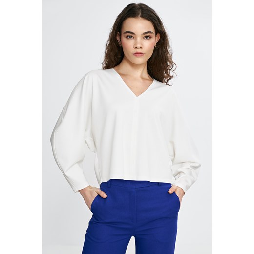 Bluzka oversize z dekoltem V - ecru ze sklepu Cudmoda w kategorii Bluzki damskie - zdjęcie 179654839