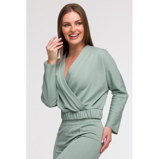 Bluza z kopertowym dekoltem - miętowa ze sklepu Cudmoda w kategorii Bluzy damskie - zdjęcie 179654876