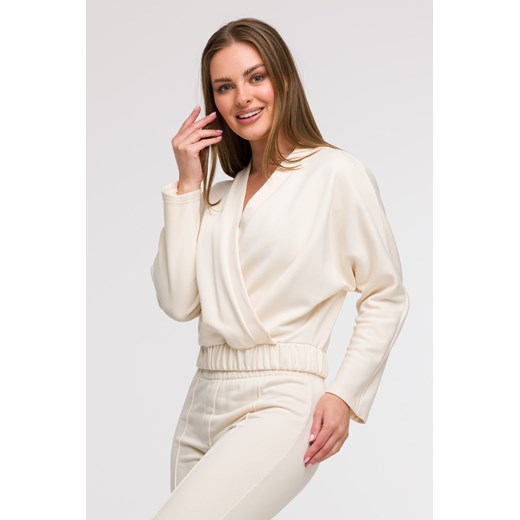 Bluza z kopertowym dekoltem - waniliowa ze sklepu Cudmoda w kategorii Bluzy damskie - zdjęcie 179654878
