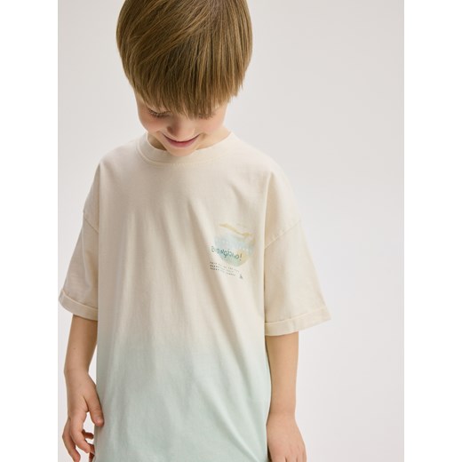 Reserved - T-shirt oversize z nadrukiem - złamana biel Reserved 134 (8 lat) Reserved