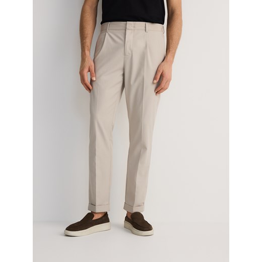 Reserved - Spodnie z dodatkiem wełny - beżowy ze sklepu Reserved w kategorii Spodnie męskie - zdjęcie 179742616