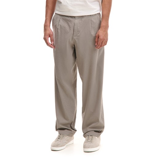 Cropp - Beżowe spodnie loose fit - beżowy ze sklepu Cropp w kategorii Spodnie męskie - zdjęcie 179836997