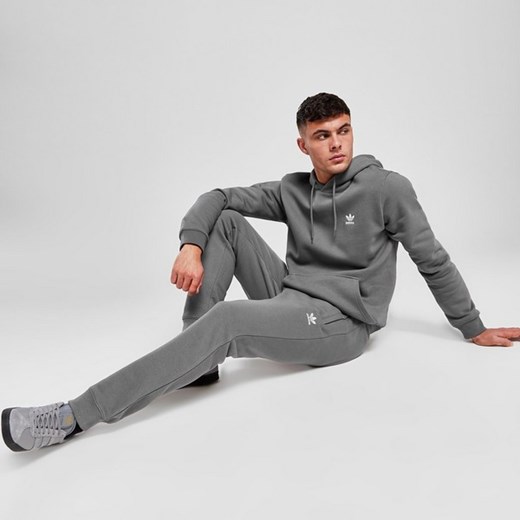 ADIDAS SPODNIE ESSENTIALS PANT ORIGINALS CORE ze sklepu JD Sports  w kategorii Spodnie męskie - zdjęcie 180175459