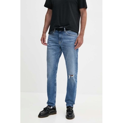 CALVIN KLEIN Błękitne męskie jeansy Slim Taper, Rozmiar 30/32 ze sklepu outfit.pl w kategorii Jeansy męskie - zdjęcie 180280969