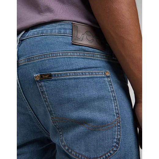 LEE LUKE MĘSKIE SPODNIE JEANSOWE LIGHT WORN L719CAVY 112319915 Lee W32 L34 YouNeedit.pl
