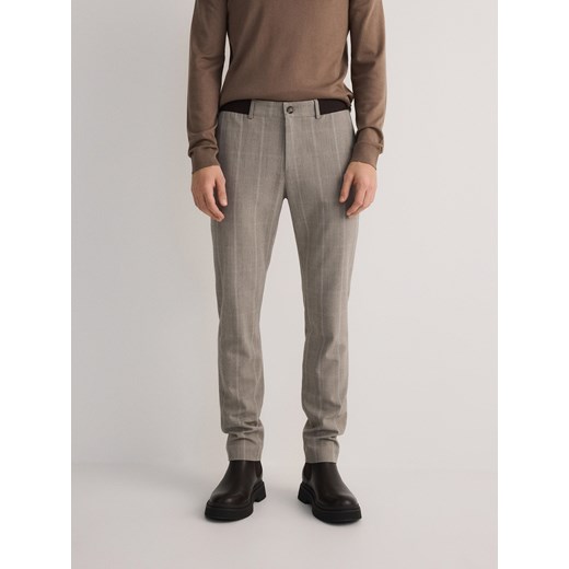 Reserved - Spodnie chino slim fit w kratę - beżowy ze sklepu Reserved w kategorii Spodnie męskie - zdjęcie 180362105