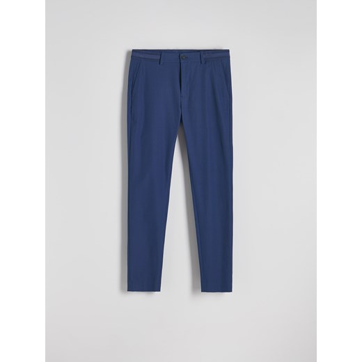 Reserved - Spodnie chino slim fit - niebieski ze sklepu Reserved w kategorii Spodnie męskie - zdjęcie 180387199