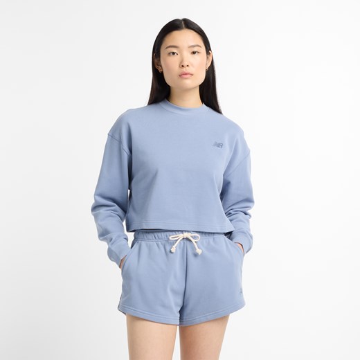 Bluza damska New Balance WT51514DUS – niebieska ze sklepu New Balance Poland w kategorii Bluzy damskie - zdjęcie 180390739