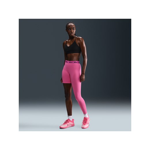 Damskie asymetryczne legginsy do koszykówki ze średnim stanem i jedną nogawką A'ja Wilson - Różowy ze sklepu Nike poland w kategorii Spodnie damskie - zdjęcie 180449926