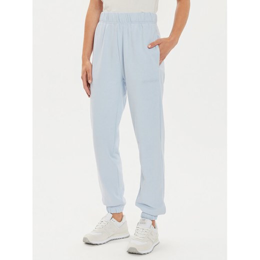 Helly Hansen Spodnie dresowe Allure 53982 Błękitny Relaxed Fit ze sklepu MODIVO w kategorii Spodnie damskie - zdjęcie 181054708
