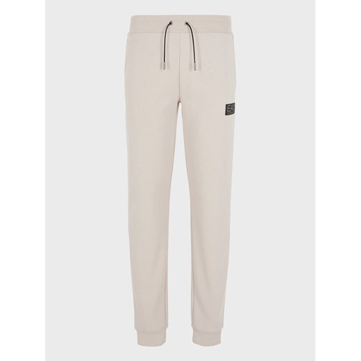 EA7 Emporio Armani Spodnie dresowe 6RPP78 PJARZ 1716 Beżowy Regular Fit ze sklepu MODIVO w kategorii Spodnie męskie - zdjęcie 181066377