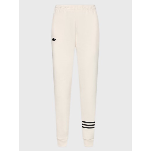 adidas Spodnie dresowe Joggers IB7320 Écru Loose Fit ze sklepu MODIVO w kategorii Spodnie damskie - zdjęcie 181069718