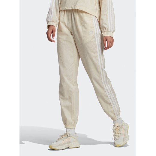 adidas Spodnie dresowe adicolor lassics Poplin Track HL9309 Écru Regular Fit 40 MODIVO