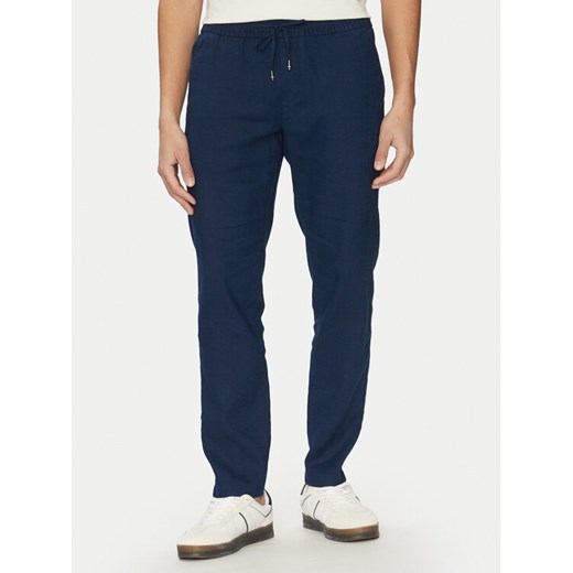 Tommy Hilfiger Spodnie materiałowe Harlem MW0MW38801 Granatowy Slim Fit ze sklepu MODIVO w kategorii Spodnie męskie - zdjęcie 181114908