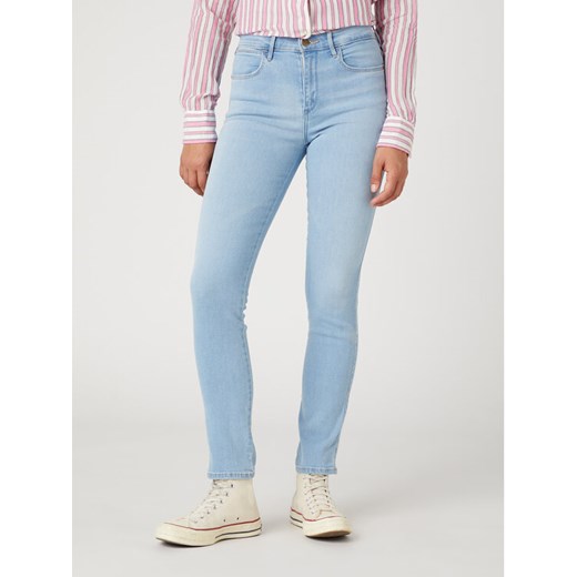 Wrangler Jeansy W26LCY37L 112332358 Błękitny Slim Fit ze sklepu MODIVO w kategorii Jeansy damskie - zdjęcie 181137305
